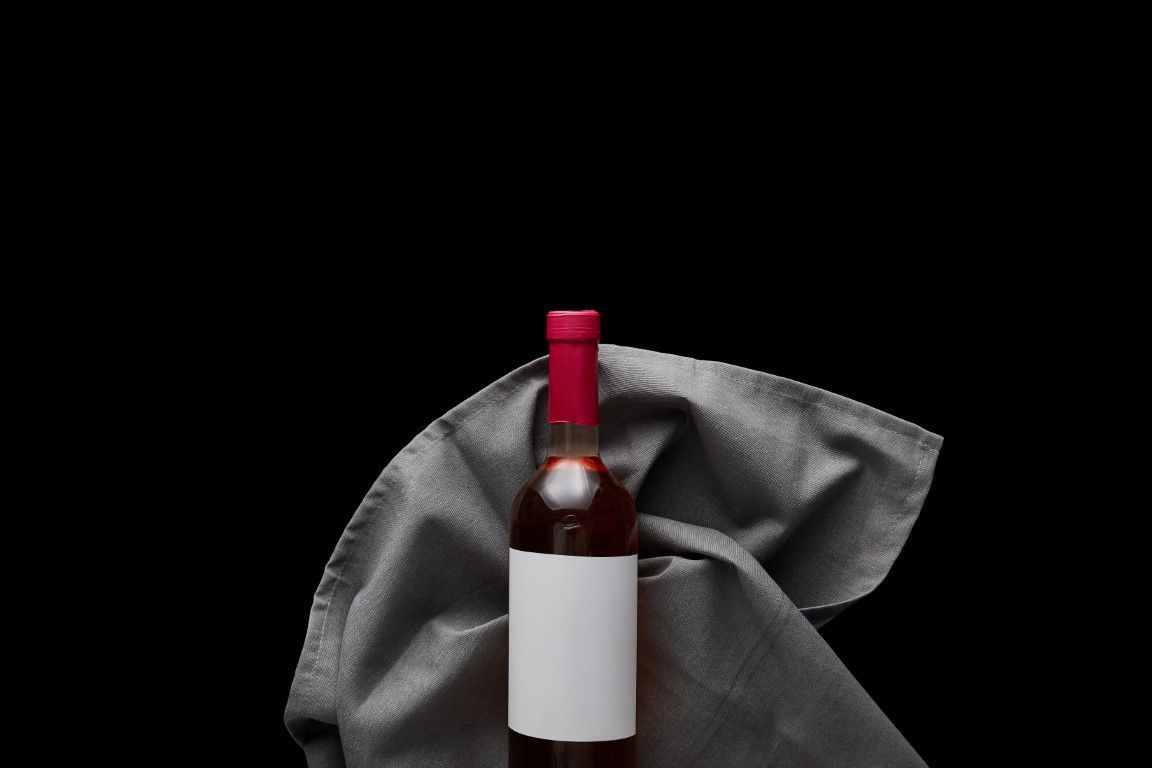 botella de vino retapado